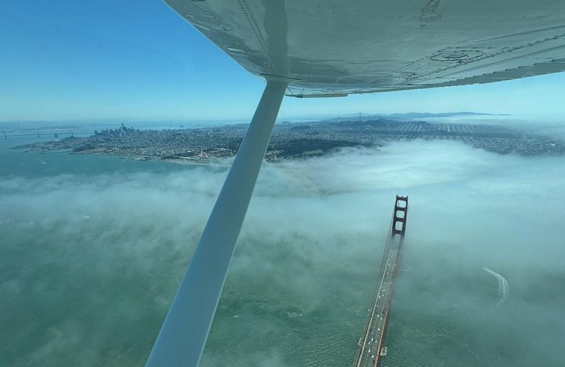 View from a Cessna wing over San Francisco Bay